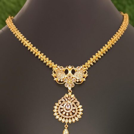 Gold-Plated Necklace with Intricate Stone Pendant